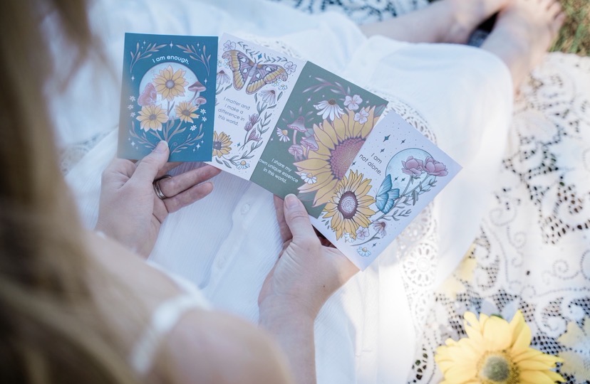 Holding the Fearless Sunflowers affirmation cards
